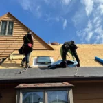 Installing new shingles for a roof replacement