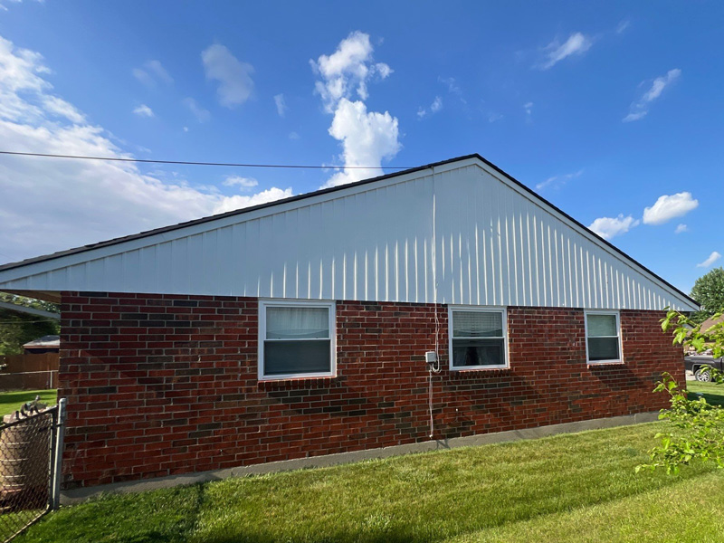 A gable roof features a triangular shape and sloped sides. They feature a classic and widely popular roof design in residential architecture.