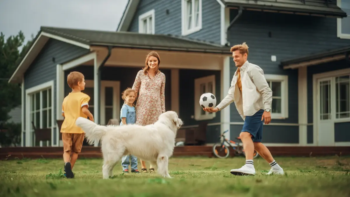 family_playing_with_dog