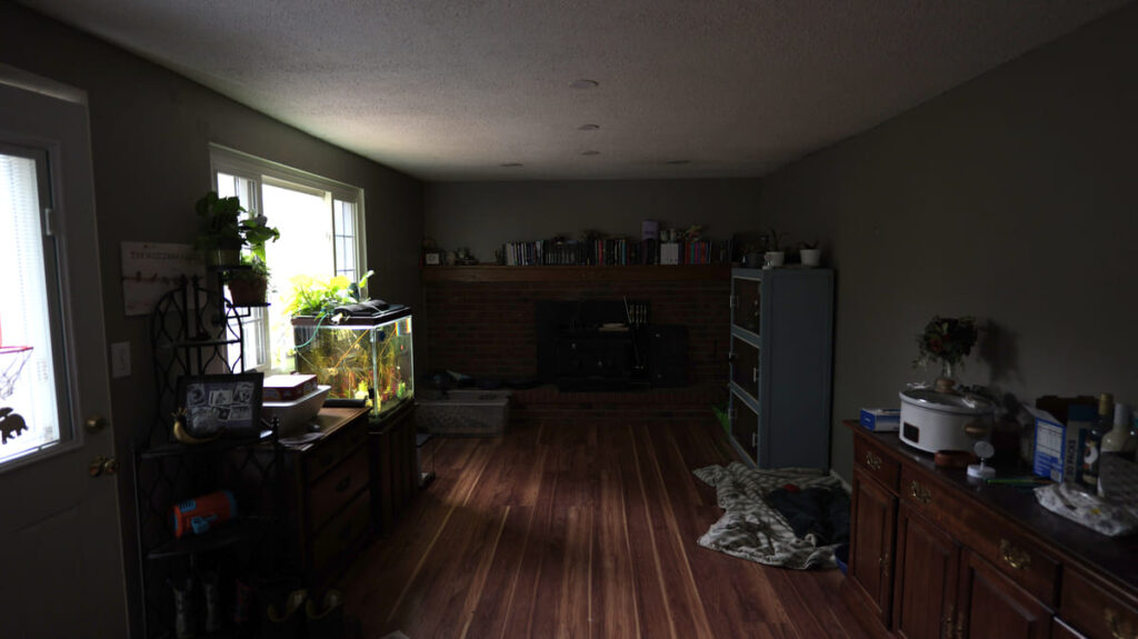 dark room with natural lighting before van martin roofing skylight install